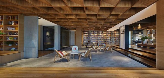 北欧工业风办公场所图书阅览休闲区装修图
