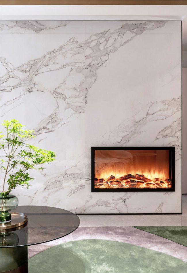 轻奢风格家居客厅电视墙壁炉装修图