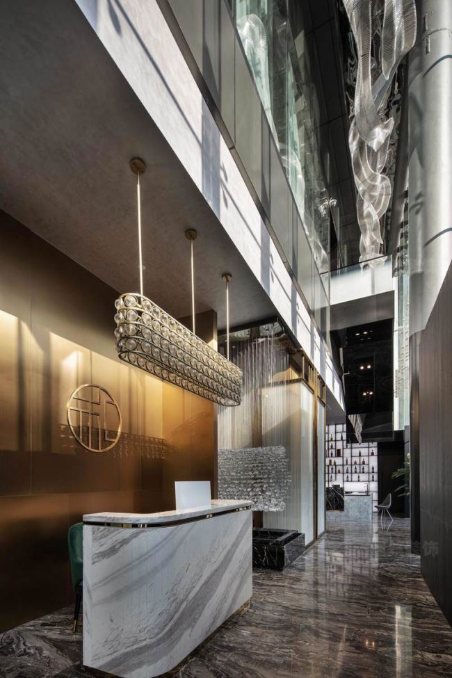 轻奢新中式办公室大堂前台区域装修图