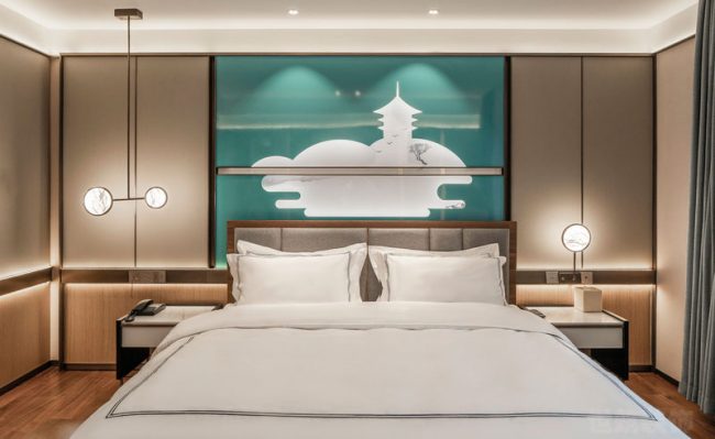 轻奢新中式商务酒店套房装修图