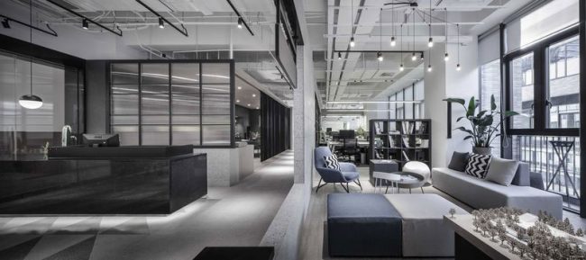 现代工业风办公室员工休息区装修图