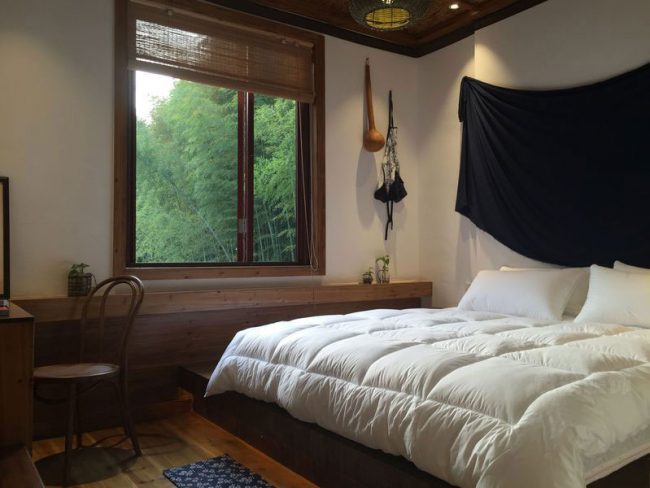 新中式民宿特色客房装修图