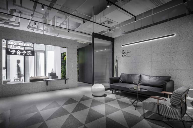 云南腾冲黑白灰现代风办公室装修公司案例接待区效果图